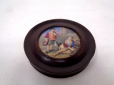 A 19th century pot lid in circular frame