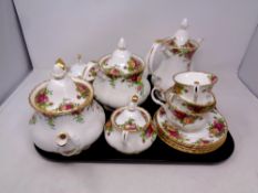 A tray of Royal Albert Old Country Roses tea china to include teapots and water jug