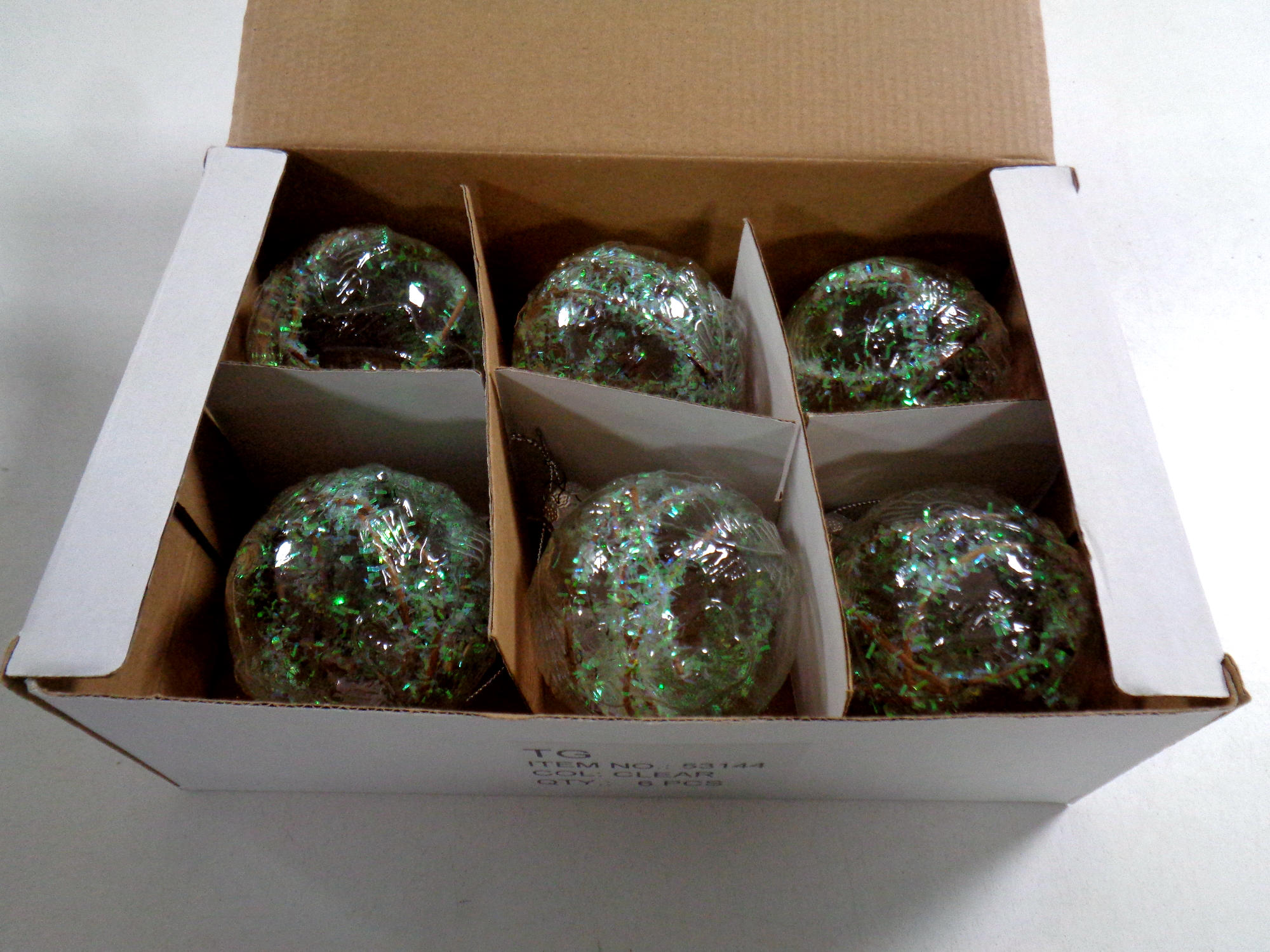 Six boxes of Christmas baubles