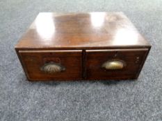 An early 20th century two drawer oak office chest