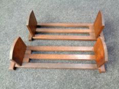 A pair of Edwardian oak sliding book stands