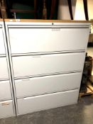 A four drawer metal document cabinet