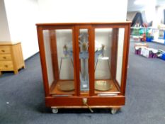 A mid 20th century mahogany cased precision balance,