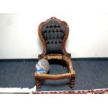 A Victorian nursing chair with button back (for re-upholstery),