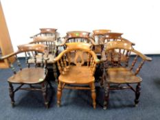 A harlequin set of nine 19th century elm smoker bow armchairs (9)