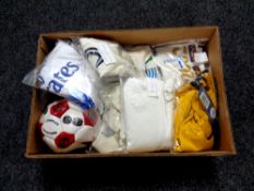 A collection of sporting memorabilia to include signed Manchester United footballs,