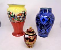 A Carltonware Rouge Royale lidded ginger jar together with two decorative vases