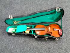 A child's violin and bow in case