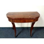 A 19th century mahogany turnover topped tea table,