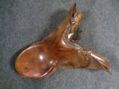 A vintage brown leather saddle