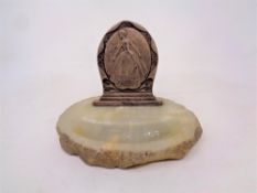 An early 20th century onyx dish with advertising metal plaque for Dry Art Fabrics