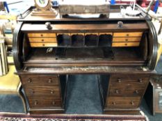 A Victorian mahogany cylinder topped desk,