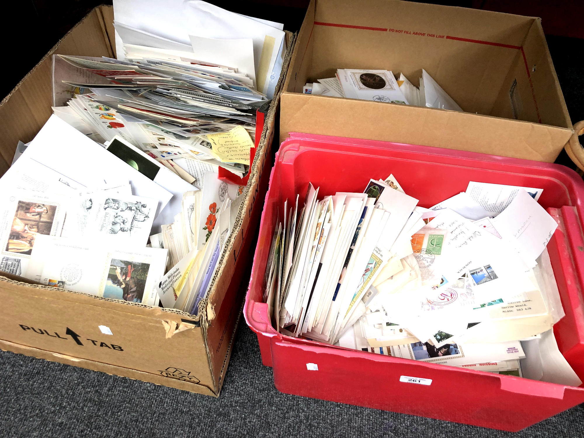Three large boxes containing a large quantity of first day covers,