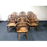 A set of ten early 19th century elm Windsor armchairs