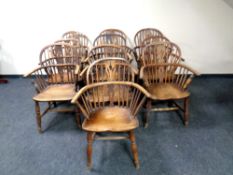 A set of ten early 19th century elm Windsor armchairs