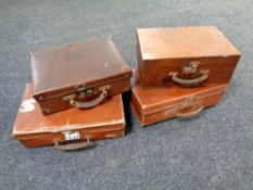 Four early 20th century suitcases