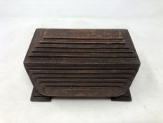 A tramp art wooden cigar box