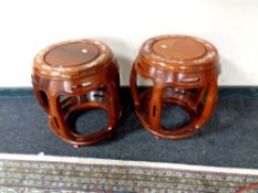 A pair of good quality Chinese hardwood occasional tables with inlaid mother of pearl tops,