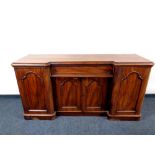 A Victorian mahogany inverted break fronted sideboard,