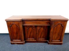 A Victorian mahogany inverted break fronted sideboard,