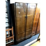 A 1930s oak wardrobe,