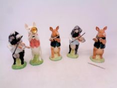 Five Beswick pig band figures