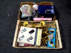 Two crates containing brass door handles,