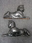 A large pair of Art Deco carved and ebonised Egyptian sphinx mounts