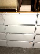 A four drawer metal document cabinet