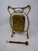 An Art Nouveau style dinner gong with beater