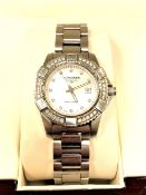 A lady's stainless steel Longines Conquest quartz calendar wristwatch with diamond set bezel and