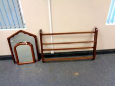 Two antique mahogany framed mirrors together with a wooden wall shelf,