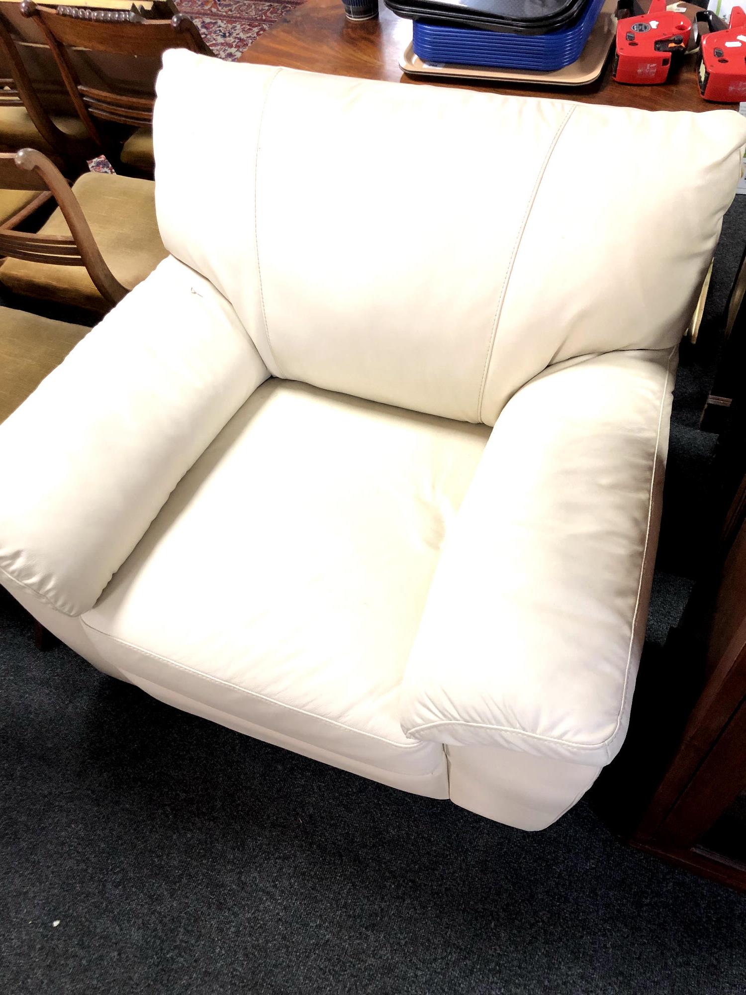 A cream leather armchair