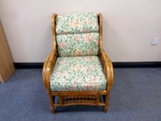 A cane conservatory armchair,