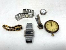 A gent's vintage silver wristwatch in curved square case, together with other watches,