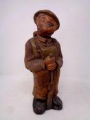 An early 20th century canvas figure depicting a first world war soldier