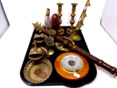 A tray containing assorted brass ware to include candlesticks,