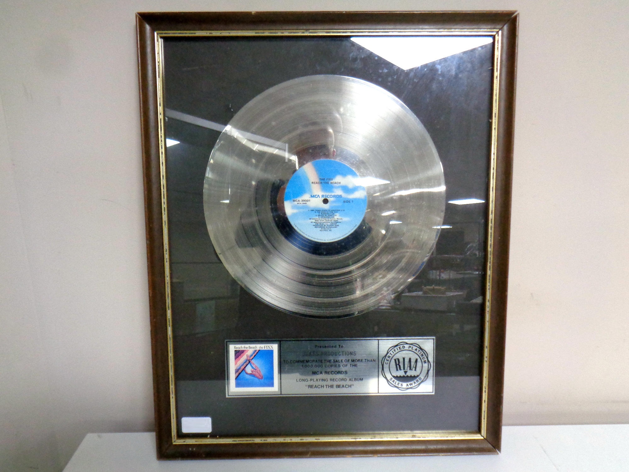 Official American RIAA Award for 'Reach the beach' by The FIXX presented to Jukes Productions to