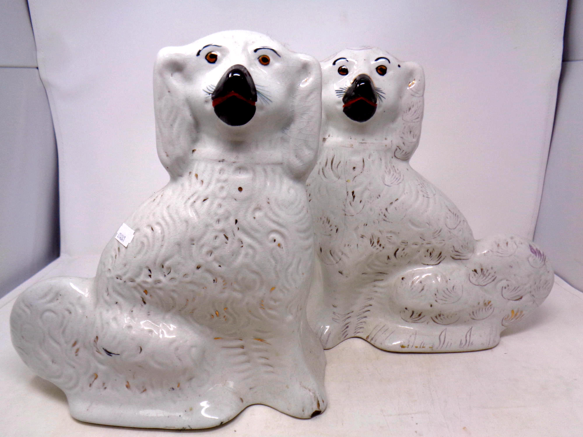 A pair of Staffordshire dogs