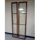 Two mahogany and glass bookcase doors