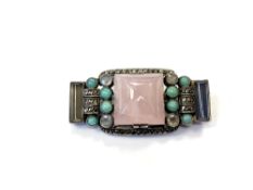 An Art Deco silver and hardstone brooch