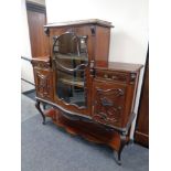 A Victorian mahogany chiffoniere on cabriole legs