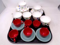 A tray containing six Imperial bone china polka dot trios together with six Vogue coffee cups with