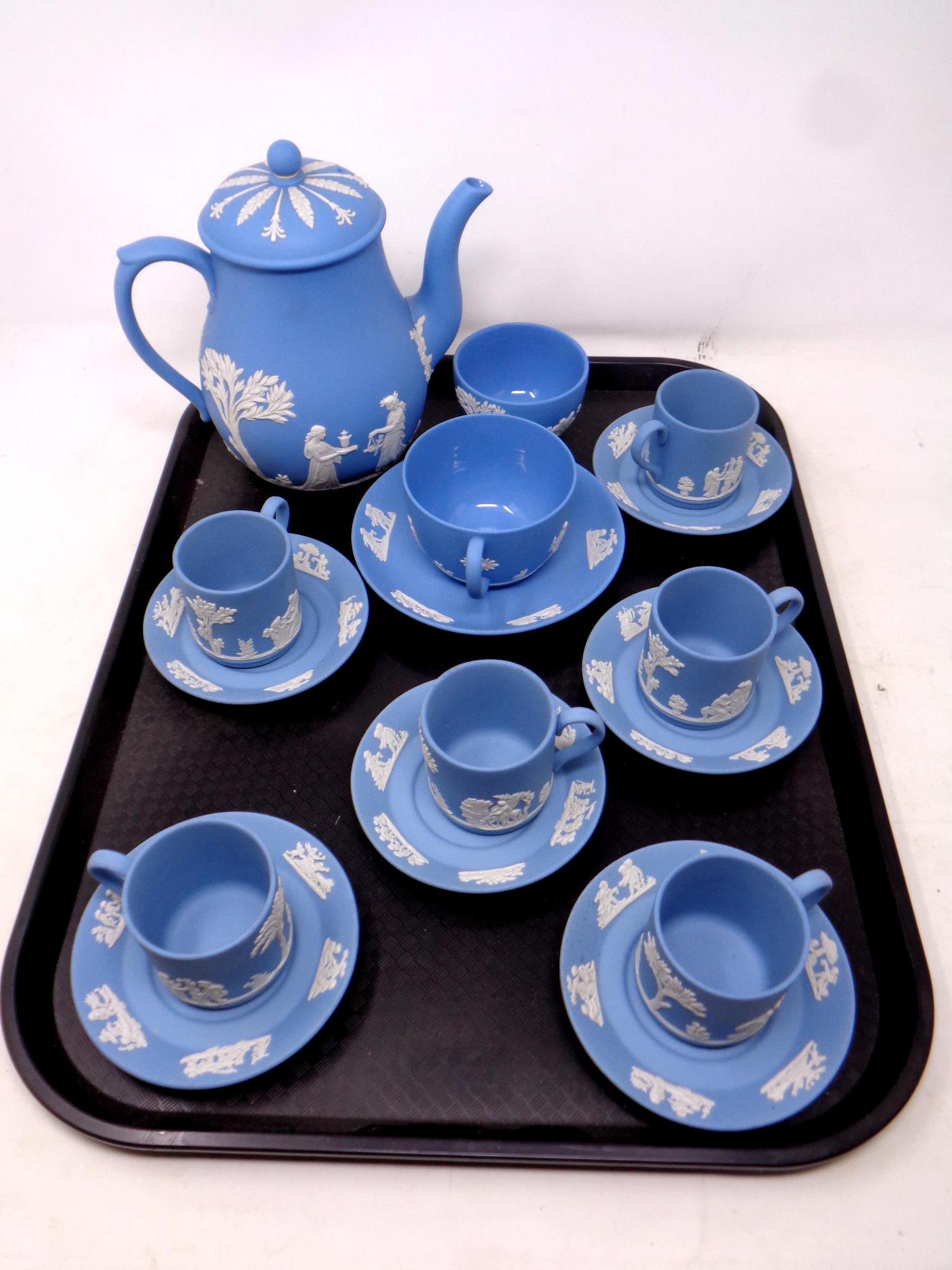 A tray containing six Wedgwood coffee cans and saucers together with four further pieces of tea