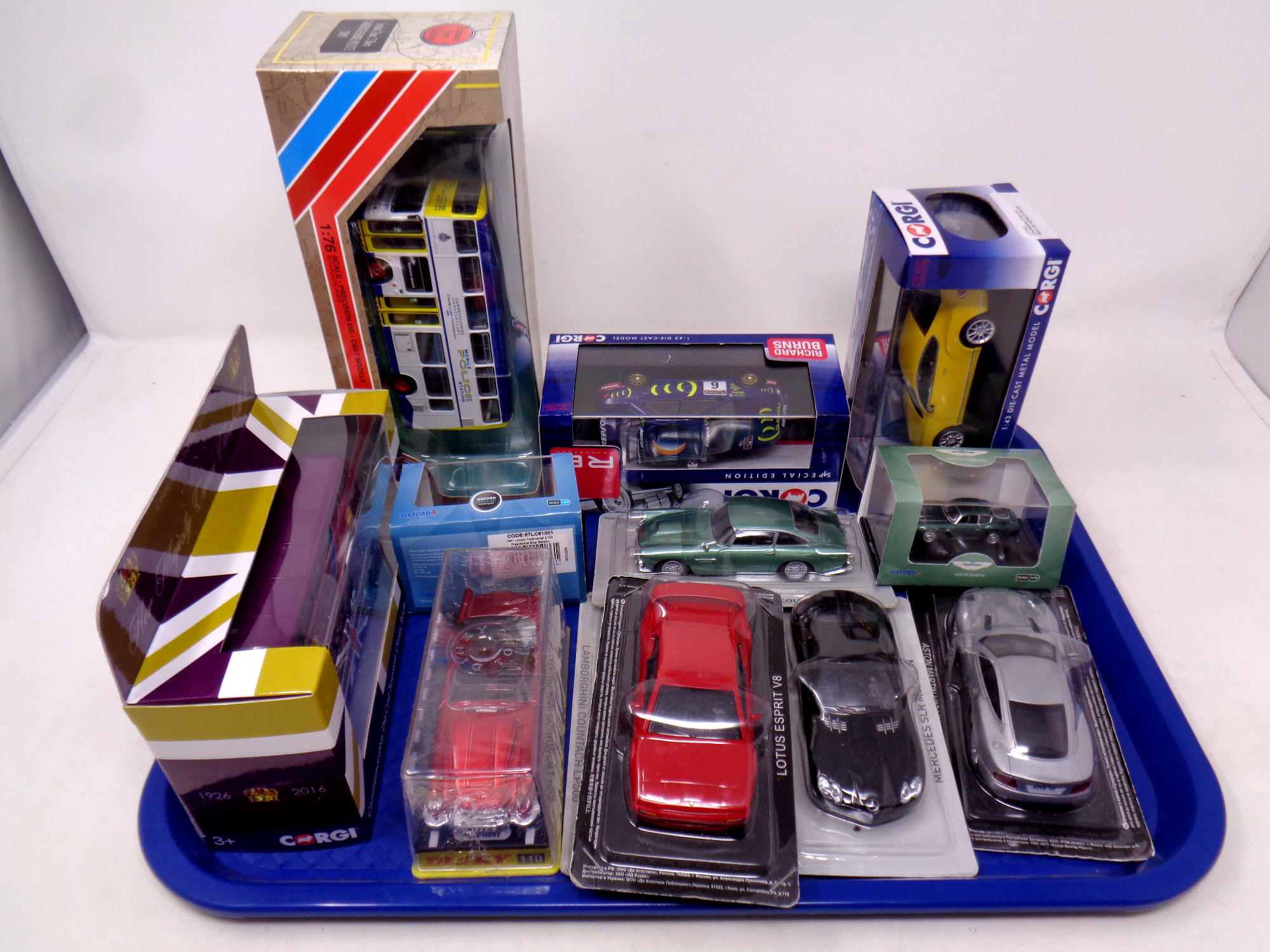 A tray containing assorted die cast vehicles and buses to include Exclusive First Editions and