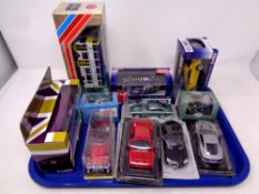 A tray containing assorted die cast vehicles and buses to include Exclusive First Editions and