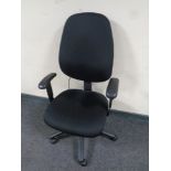 A black fabric upholstered adjustable office armchair