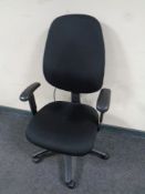 A black fabric upholstered adjustable office armchair