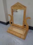 A satinwood Art Deco dressing table mirror fitted a drawer