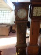 A continental painted longcase clock with circular dial